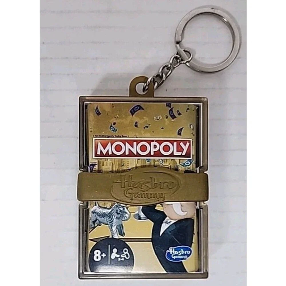 Hasbro 4 Mini Keychain Games Monopoly, Clue, Operation, Trivial Pursuit 2021